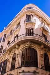 Fototapeta na wymiar Facade. Facade of a building in the city of Malaga. Costa del Sol, Andalusia, Spain. Picture taken – 15 March 2019.