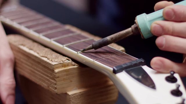 Changing guitar frets