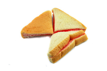 Sandwich homemade with strawberry jam in bread for breakfast isolated on white background