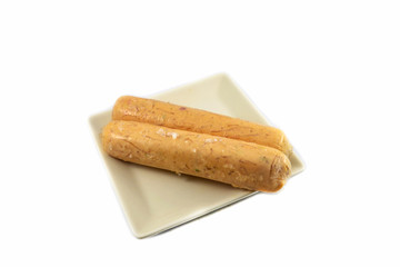 Sausage long with pork and vermicelli on white plate isolated on white background