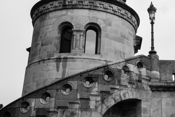 Obraz premium Public Park. Budapest- Fisherman's Bastion is a neo-Gothic and neo-Romanesque style structure situated on the Castle hill in Budapest. Shot on a rainy day.
