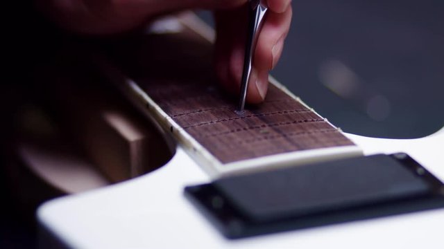 Fixing a guitar fretboard