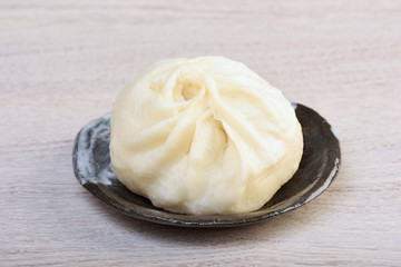 Steamed stuffed buns on a plate  