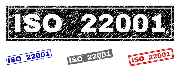 Grunge ISO 22001 rectangle stamp seals isolated on a white background. Rectangular seals with distress texture in red, blue, black and gray colors.