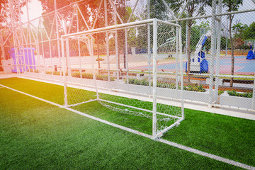 Goal nets on futsal field green grass sport outdoors