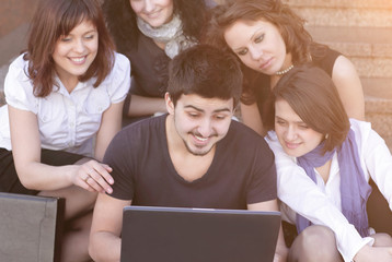 closeup. groups of students with a laptop