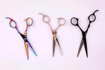 Top view professional scissors for haircuts isolated on white background