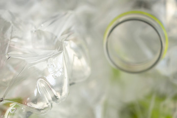 Crushed plastic bottles for recycling abstract background