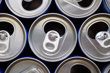 Empty aluminium drink cans recycling background concept