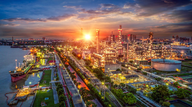 Oil and gas industry - refinery factory - petrochemical plant at sunrise