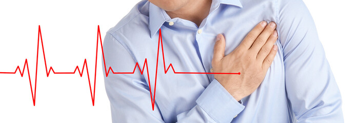 Young man suffering from chest pain on white background