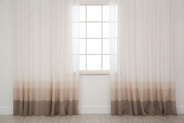 Fototapeta na wymiar Modern window with curtains in room. Home interior