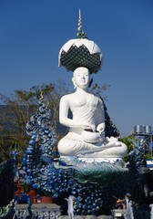 Obraz premium Bouddha blanc sous une fleur de lotus
