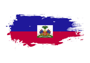 Grunge brush stroke with Haiti national flag. Watercolor painting flag. Symbol, poster, banner. Vector Isolated on white background.