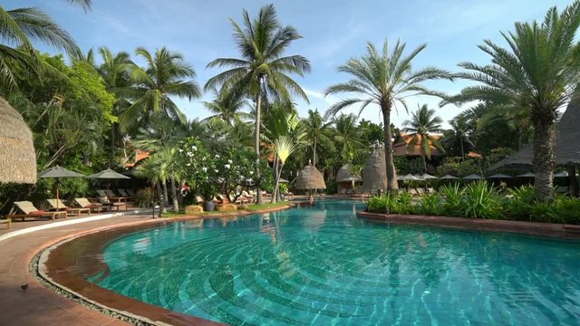 Exotic vacation concept. Swimming pool in luxury tourist resort