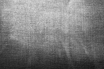 Shabby denim texture for background. Black jeans 