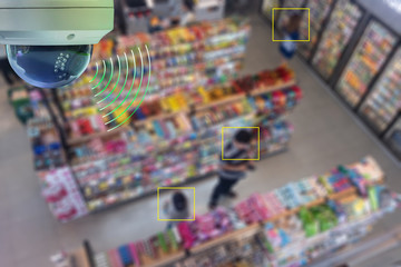 A Dome CCTV  infrared camera  technology 4.0 for look security area of people at convenience shop ...