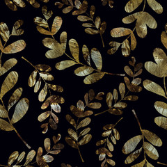 branches and leaves with abstract golden color texture on a dark background
