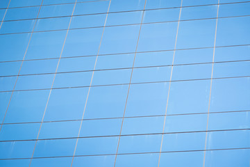 Modern office building with  blue glass windows