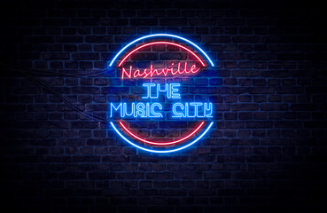 A red and blue neon light sign that reads: Nashville the Music City - obrazy, fototapety, plakaty
