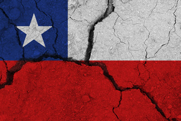 Chile flag on the cracked earth