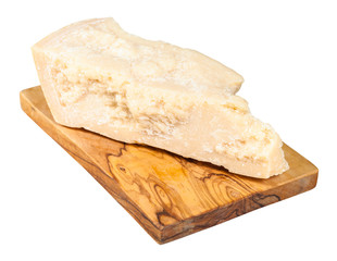 Parmigiano Reggiano hard cheese on board isolated
