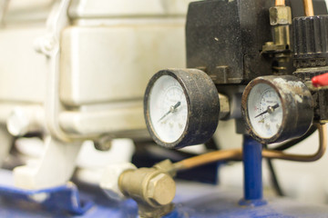 Pressure Gauge tool equipment, pressure gauge on a gas regulator in a laboratory analytical equipment.