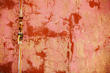 rusty the gas valve on the background of old walls, with free text space.