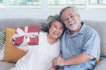 Happy love Elderly couple smiling Happy to receive surprise gifts, Senior couple old man and senior...