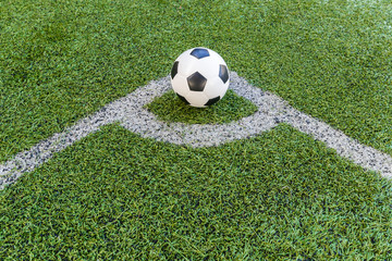 Fototapeta na wymiar soccer Football on Corner kick line of ball and a soccer field , football field , background texture