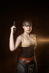 Post apocalyptic girl without hand with desert the background	