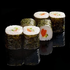 Japanese rolls, sushi on a black background