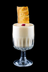 Hot cocktail of Pina Colada. On black background