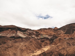 Color mountains of Death valley. The variegated slopes of Artists Palette in Death Valley, California. Various mineral pigments have colored the volcanic
