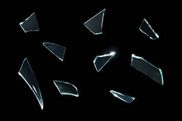 broken glass with sharp pieces over black - Powered by Adobe