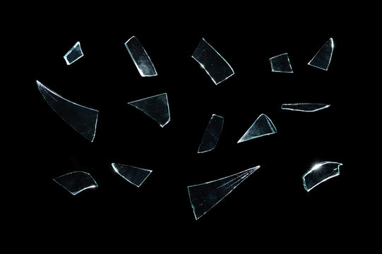 broken glass with sharp pieces over black