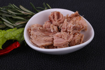 Tasty canned tuna fish in the bowl