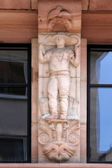 The astrological sign of Scorpio, relief on house facade in Aschaffenburg, Germany 