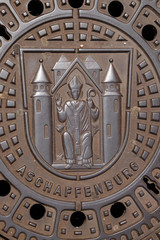Coat of Arms of Aschaffenburg on the manhole cover in Aschaffenburg, Germany
