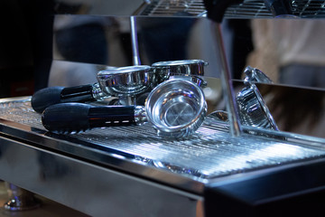 Barista working in a coffee shop, Close up of barista presses ground coffee using tamper, Barista Make Coffee Portafilter Concept