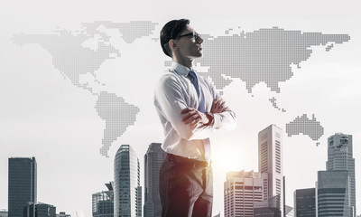 Concept of business success and control with confident boss against cityscape background