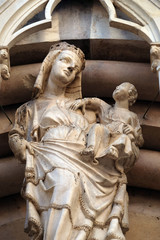 Virgin Mary with baby Jesus and Saints, portal of Saint Michele in Borgo church in Pisa, Italy