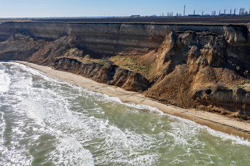 Mountain landslide in an environmentally hazardous area. Large crack in ground, descent of large...