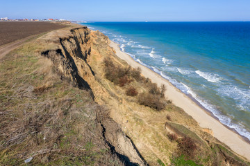 Mountain landslide in an environmentally hazardous area. Large crack in ground, descent of large...