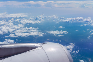 Fototapeta na wymiar Beautiful Landscape view from windows aircraft with clear blue sky