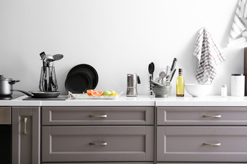 Utensils with products on counter in kitchen