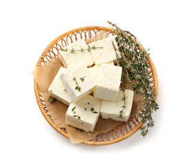 Plate with tasty feta cheese on white background