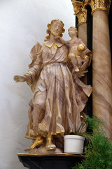 Obraz premium Saint Joseph, statue in the Church of Saint Bartholomew in Leutershausen, Germany 