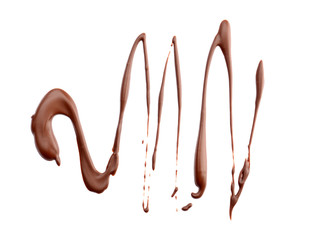 Spilled melted chocolate on white background