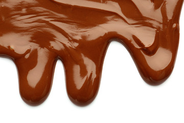 Stains of melted chocolate on white background